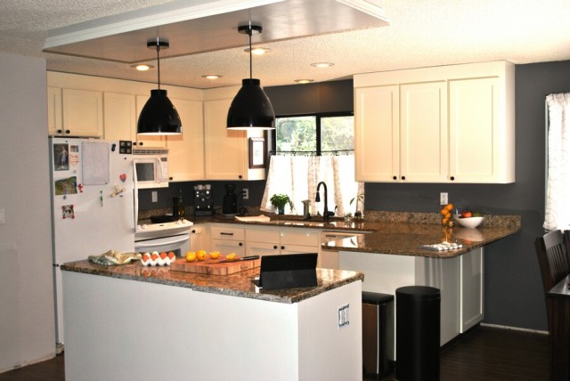 white kitchen with santa cecilia granite